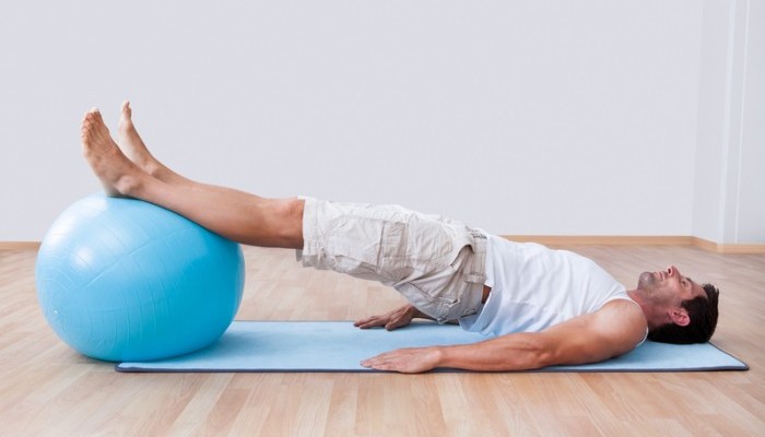 A Handy List Of Pilates Ball Exercises To Address Your Fitness Concerns